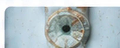Blue-green staining around a drain
