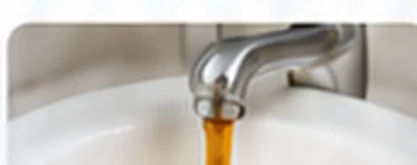 Orange rust-colored water stain